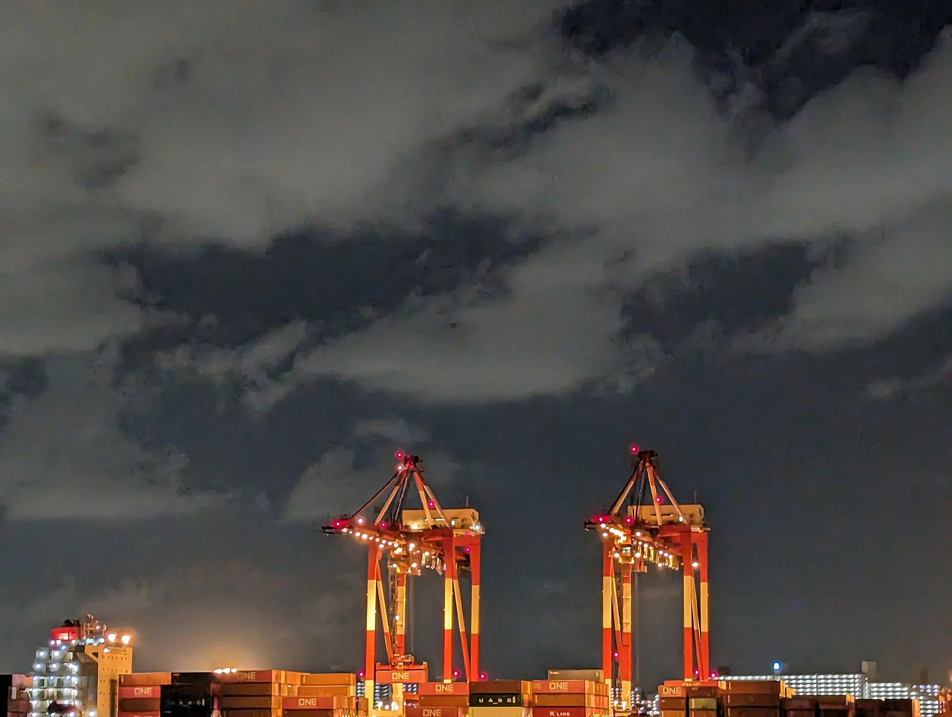 Gantry cranes over containers at the port